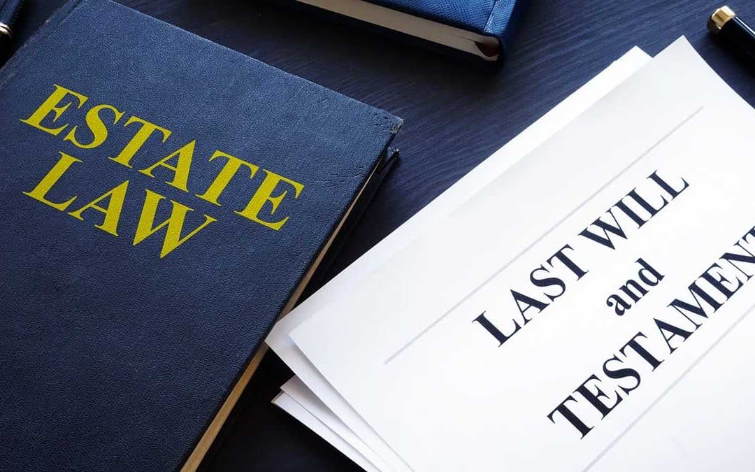 Probate Law Book and Last Will and Testament on a table