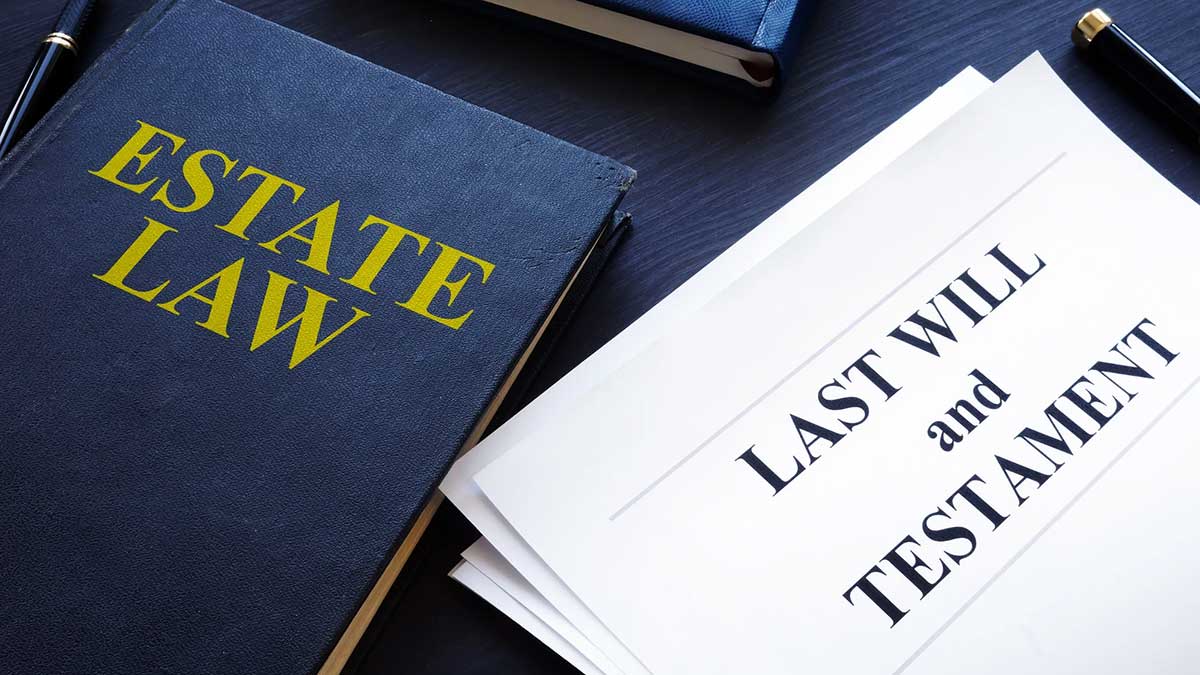 Probate Law Book and Last Will and Testament on a table